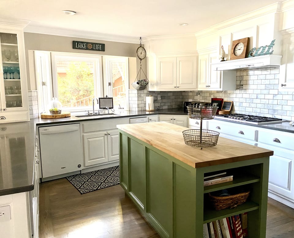 Kitchen w/ 6 ft chopping island.  Sink in bay window with views of the lake.