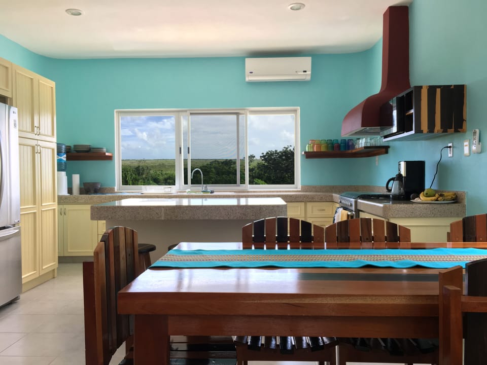 Kitchen with mangrove views and ocean peek