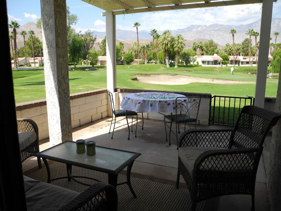 View from back patio sitting and dining area.