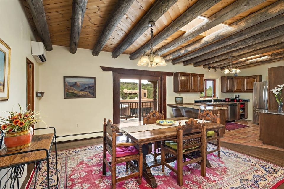 Open kitchen and dining area with large deck facing west
