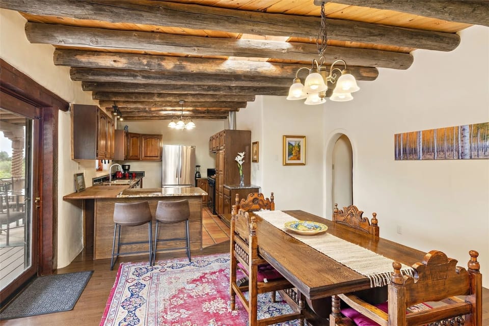 open kitchen and dining area with counter bar
