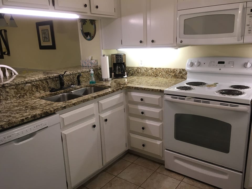 Kitchen with granite countertops.