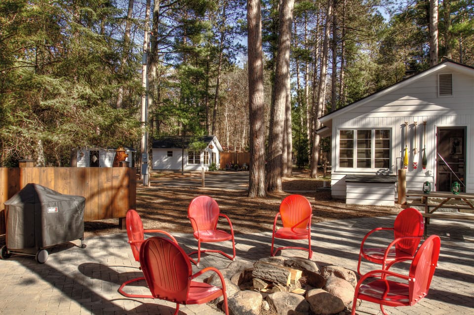 Patio and Cabin - Guest House and Sauna in Background