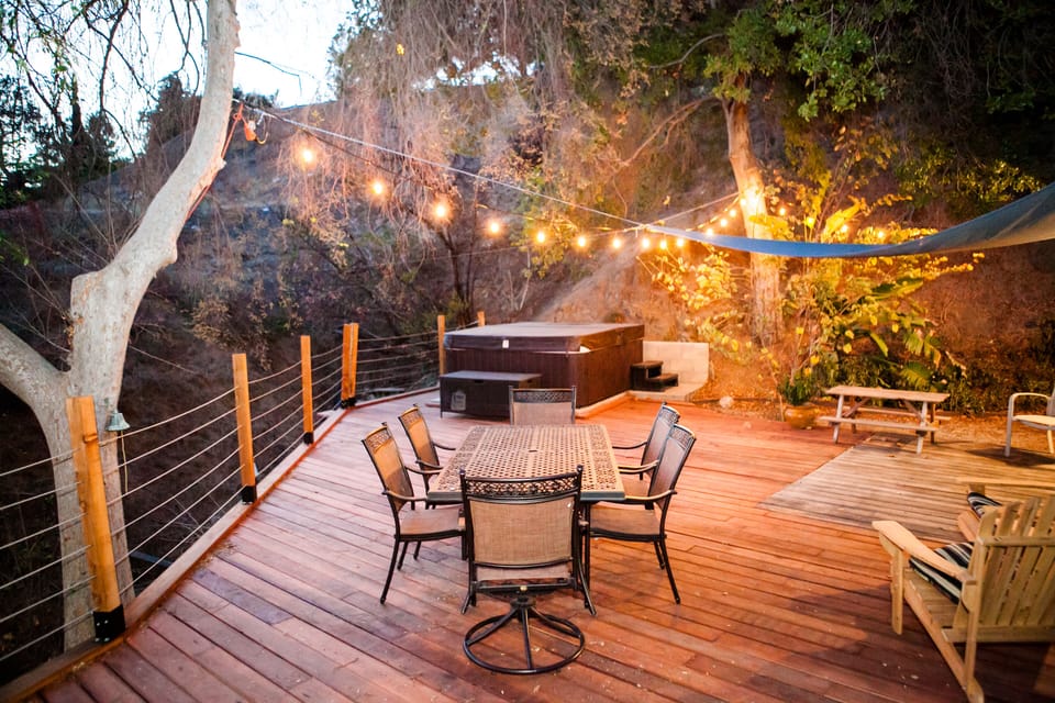 Our enormous rear deck is quite comfortable year round.