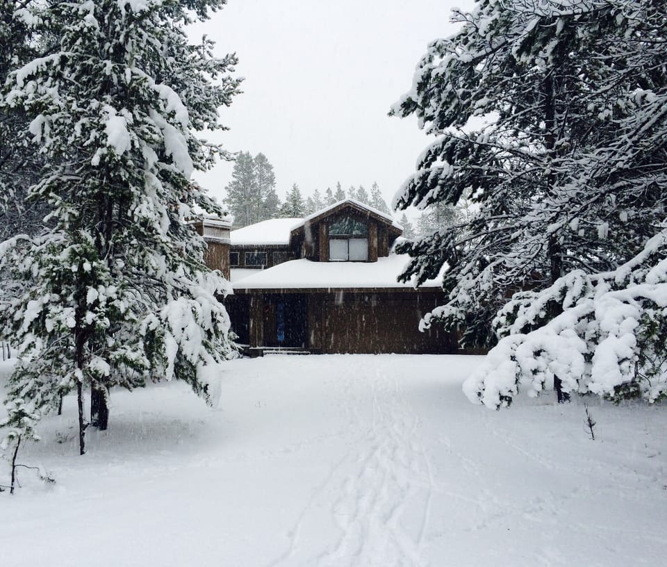 Front exterior with snow fall