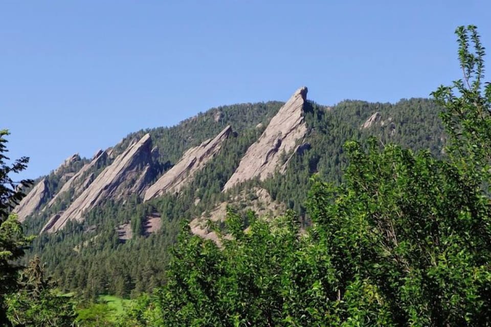 View of Flatirons from upper deck, taken by guests in May 2014.