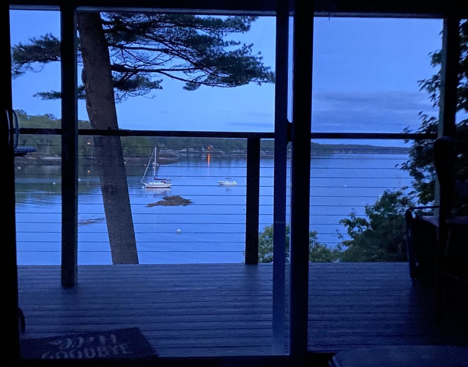 New deck and railing - view from living room sofa at dusk