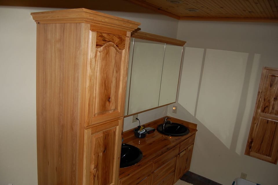 Partial view of the bathroom and shower room. Washer and dryer are in this room 