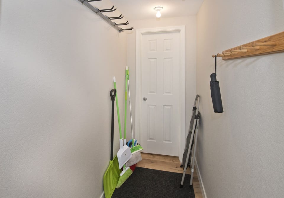 Large coat closet off entry for skis, ski boots, coats. 