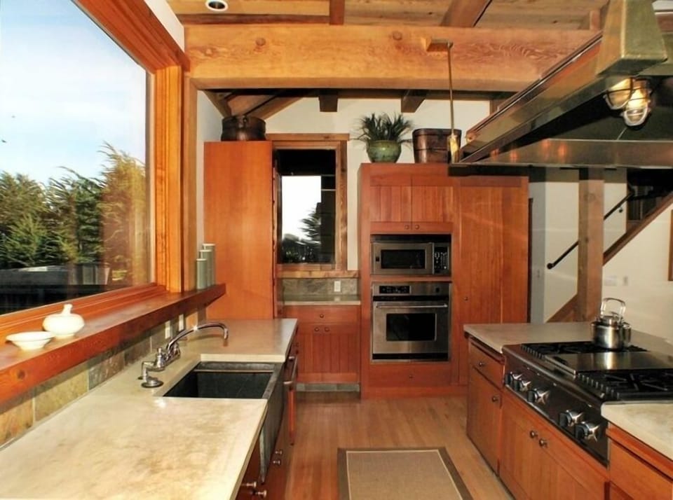Fully Equipped Gourmet Kitchen w/Stainless Appliances & Concrete Countertops