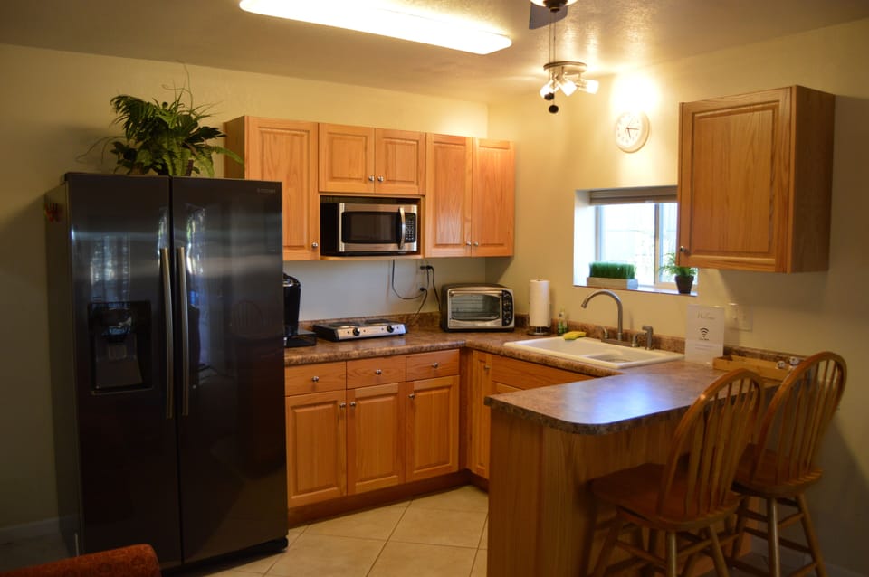 Small pantry kitchen with breakfast bar