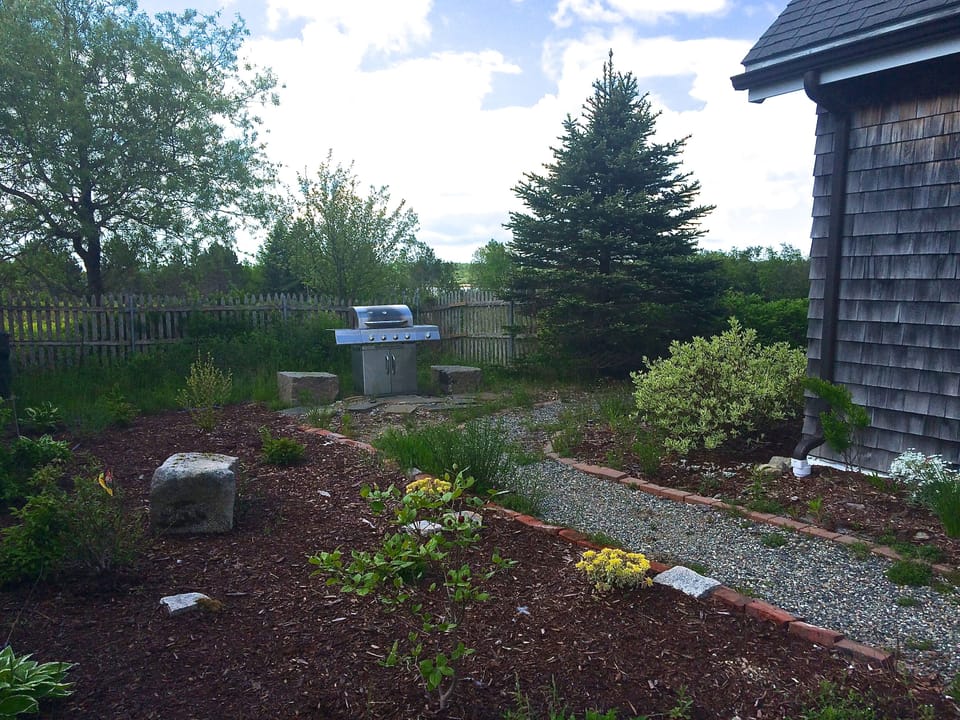 Your Secret Garden & BBQ! Privacy fence & your own parking area to left of photo