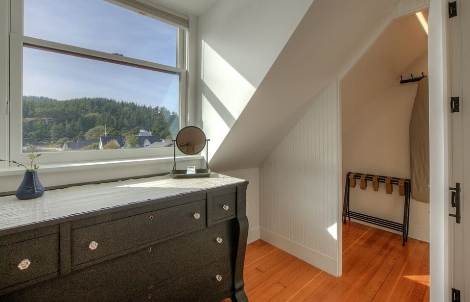 Master bedroom dresser and walk-in closet.