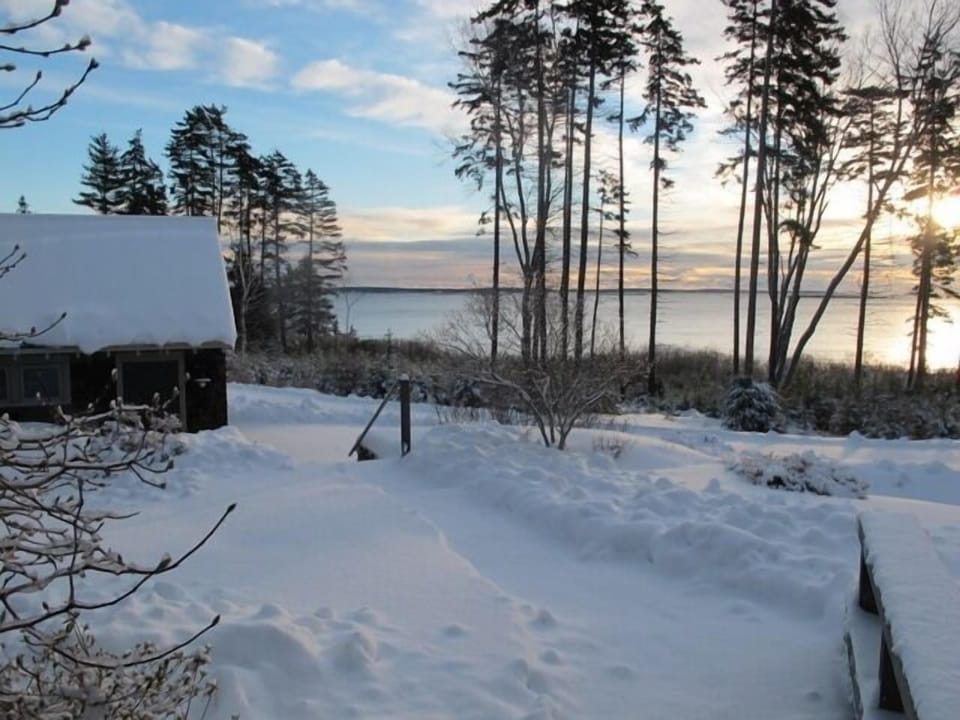 A view from the property in the winter at sunrise, cloaked in fresh powder.