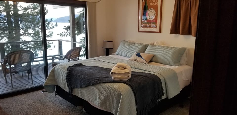 The King Room 2 has a shared porch and uses the full bath across the hall.