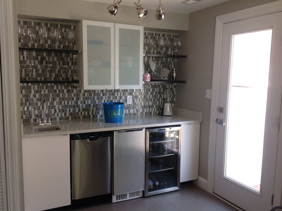 New wet-bar in the den has a dishwasher, mini fridge and awesome ice-maker!