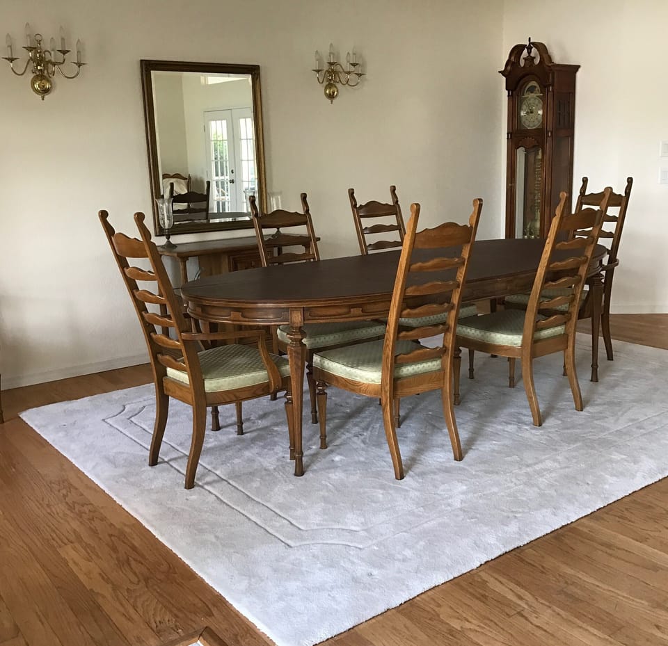 Dining Room with table seating 8 and dinnerware for entertaining 
