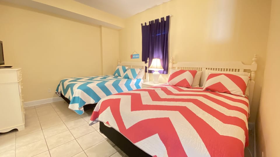 The two queen size beds in the second bedroom can sleep four people no problem.