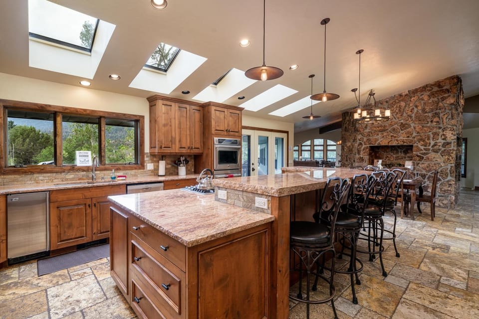 Kitchen - 5 seats at bar; 6-8 seats at kitchen table 