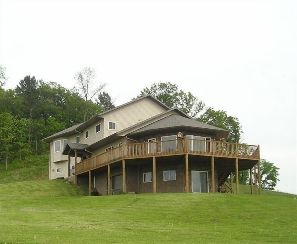 Our home! We've added a ~900 sq. ft. apartment to share this experience with you