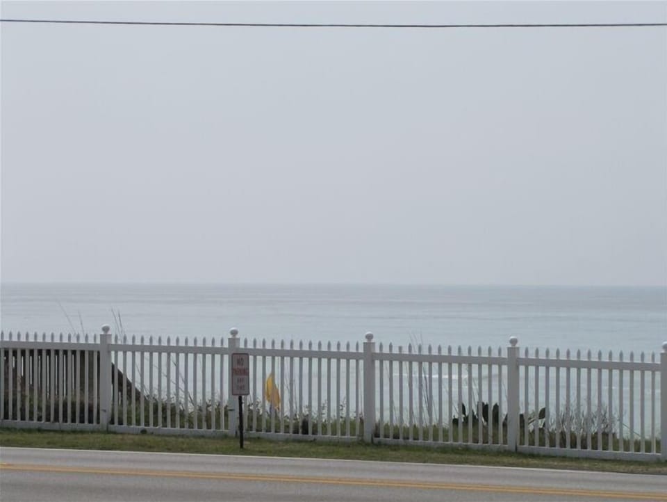 Private Beach access across the street. Taken from the balcony. 