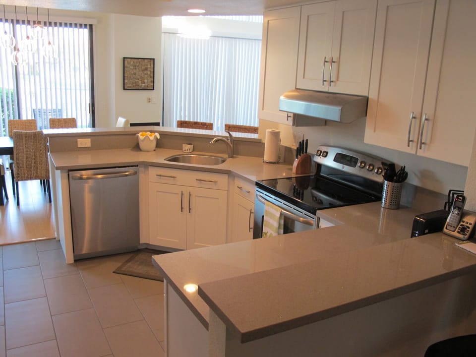 Kitchen- new cabinets, quartz counter tops and stainless appliances.