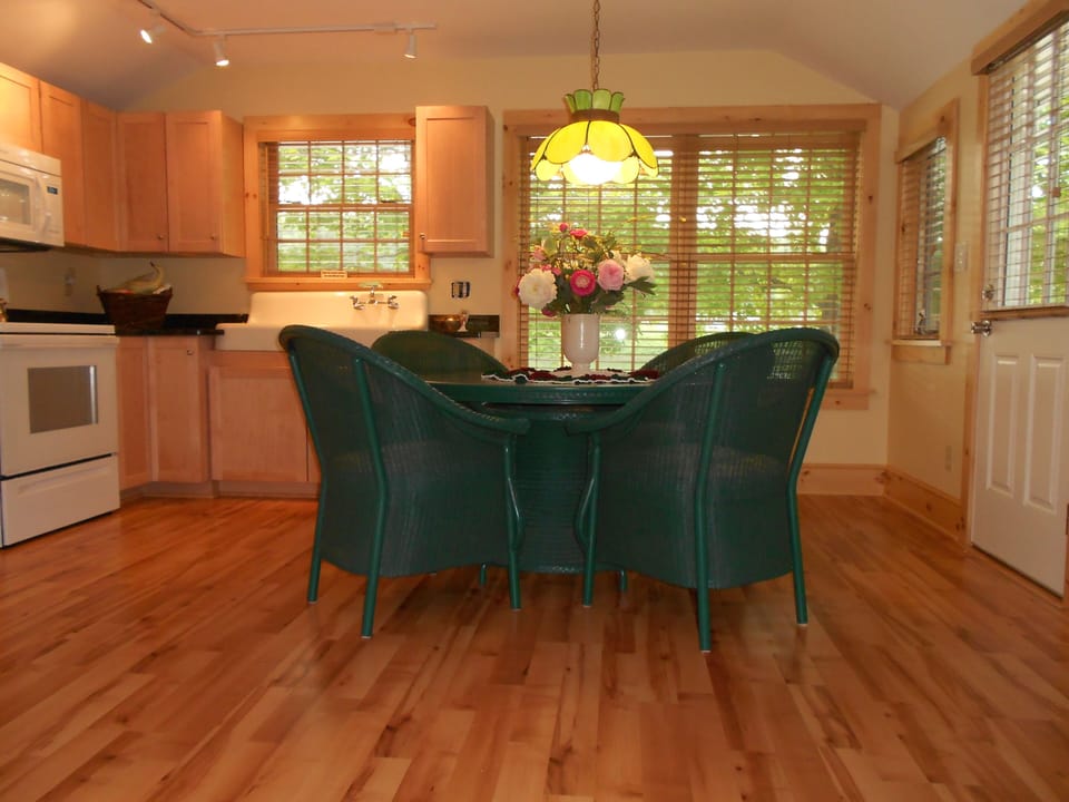 Newly renovated kitchen with dining table & 4 chairs overlooking Lake Algonquin