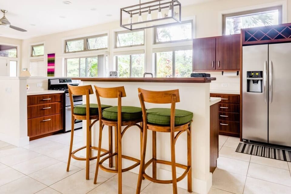 Bar seating in kitchen area.
