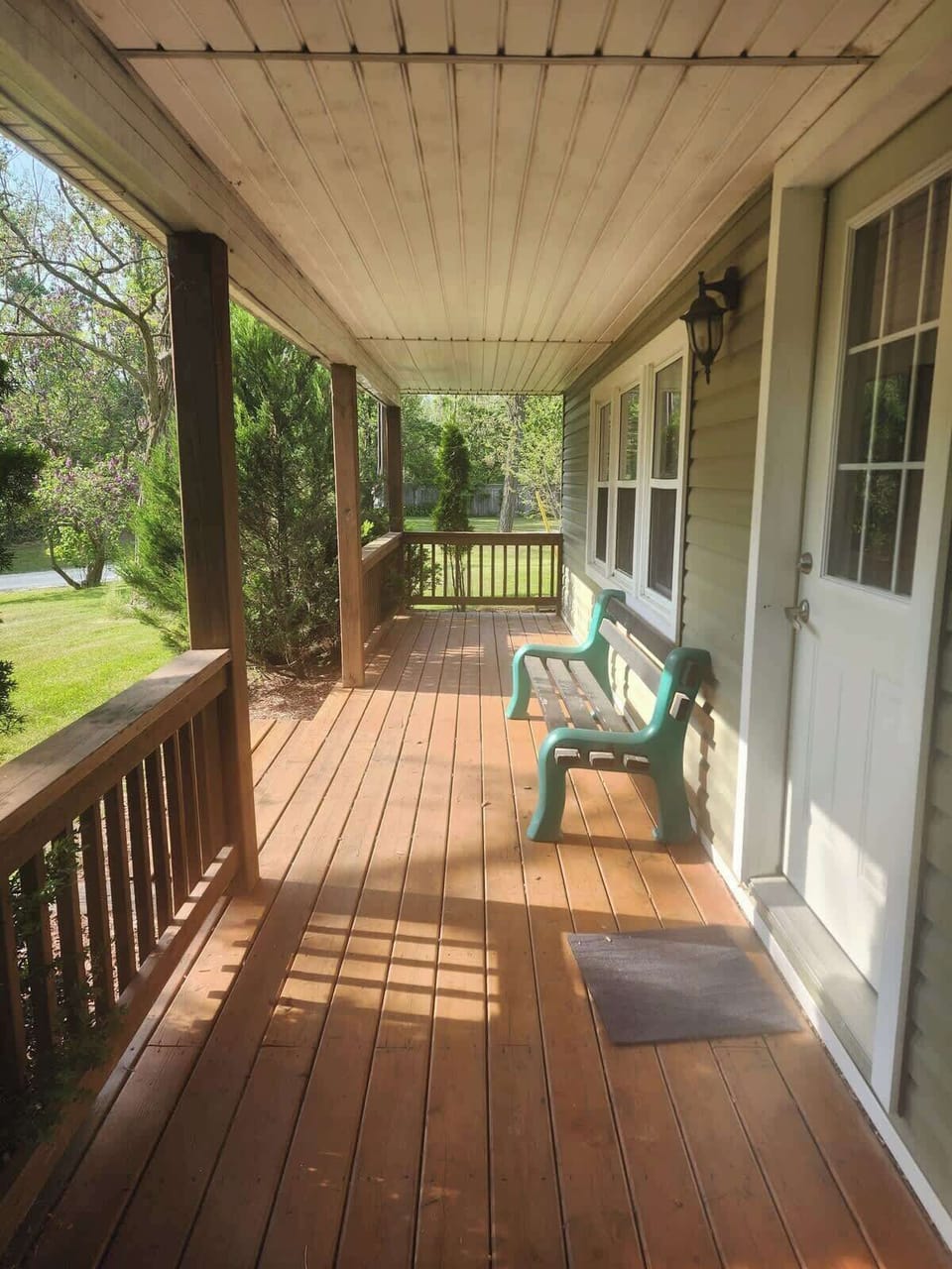 Front porch, off the kitchen, perfect place to watch the sunsets! Or sunrises! 