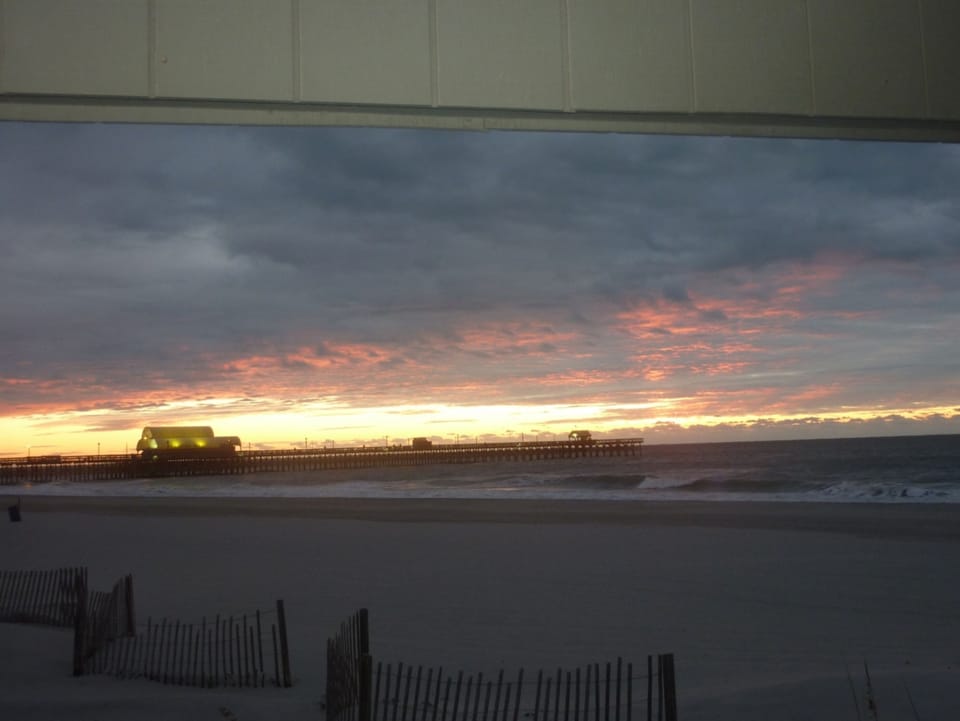view from balcony of sunrise over Apache Pier