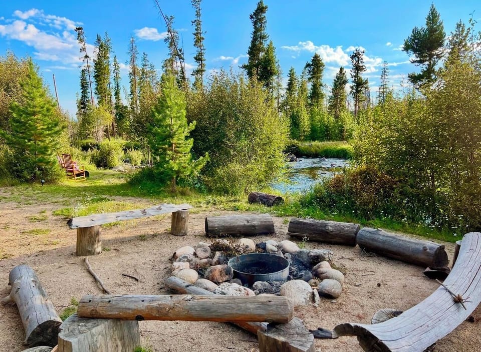 Riverfront beach firepit with firewood included