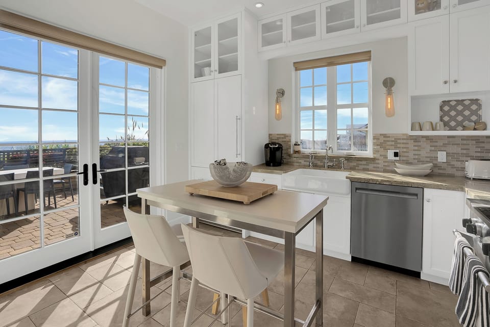 Fully stocked Kitchen for indoor and outdoor entertaining. Grill right outside!