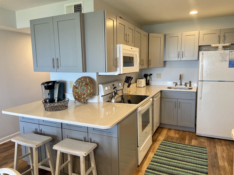 New Kitchen May 2020 - quartz, cabinets, oven, microwave.