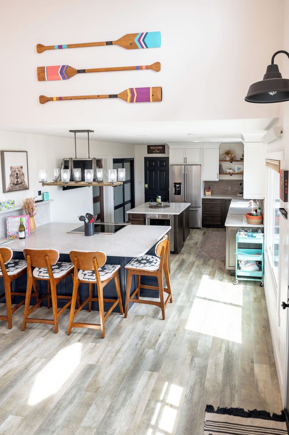 Bright designer kitchen with double islands and stylish bar seating