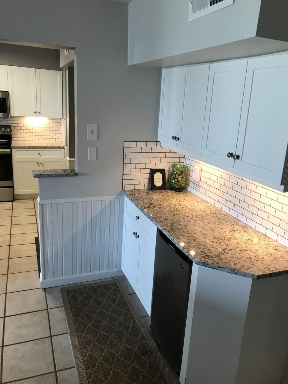 Bar area outside kitchen--with small beverage refrigerator