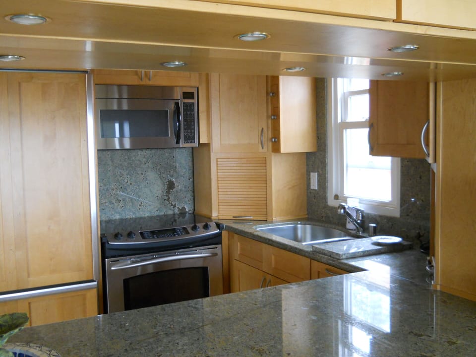 Modern kitchen, granite counter tops, with modern appliances.