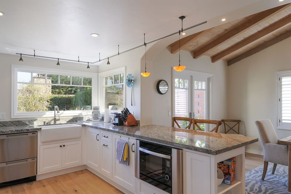 Fully stocked kitchen with bar seating