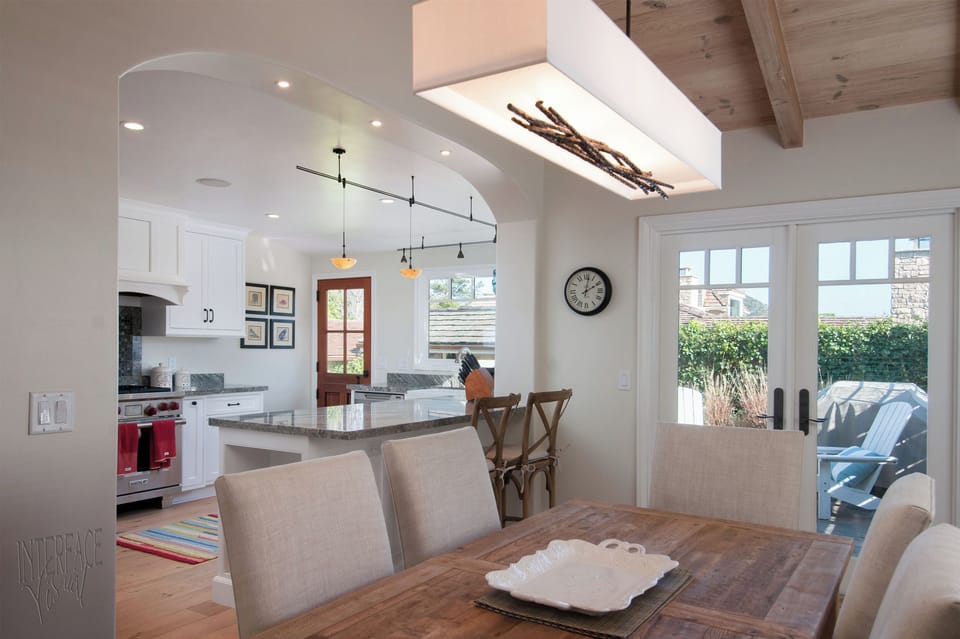 Dining Area with adjoining kitchen and acccess to rear private patios