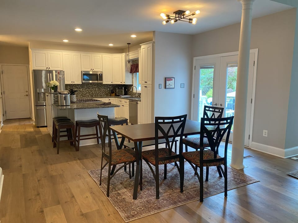 open and airy kitchen with large island and seating for 10