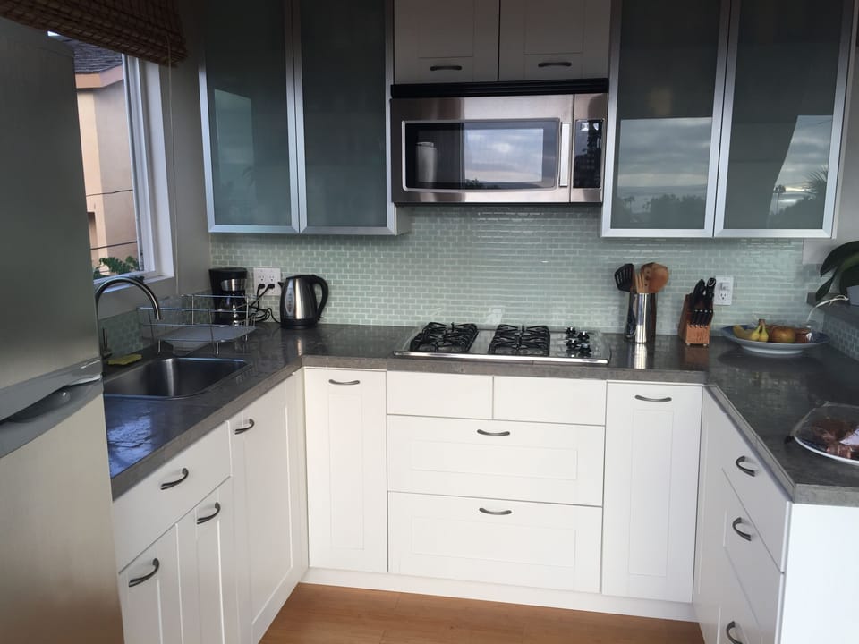 Ikea kitchen, fully equipped for a cook.