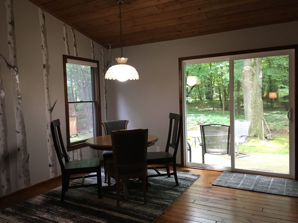 Dining Area Opens to Deck and Private Backyard~
