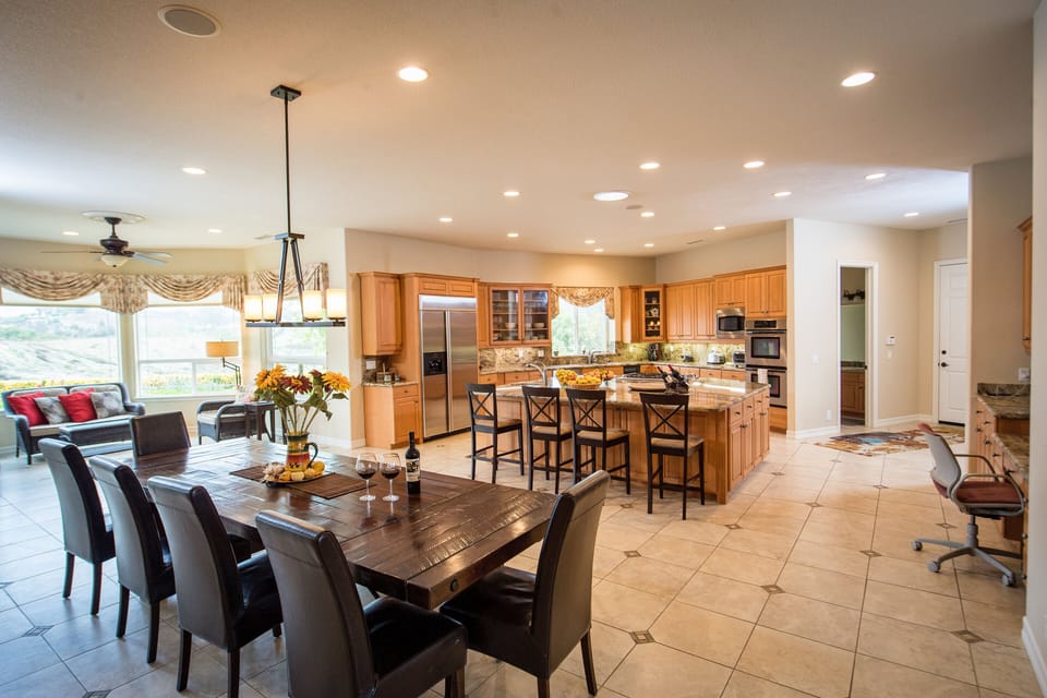 Dining table seats 12. Open kitchen makes it fun for all - even the cook.