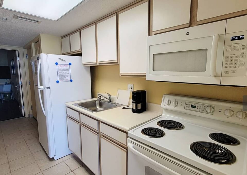 Gally Kitchen with full-size fridge, stove, microwave for all your cooking needs