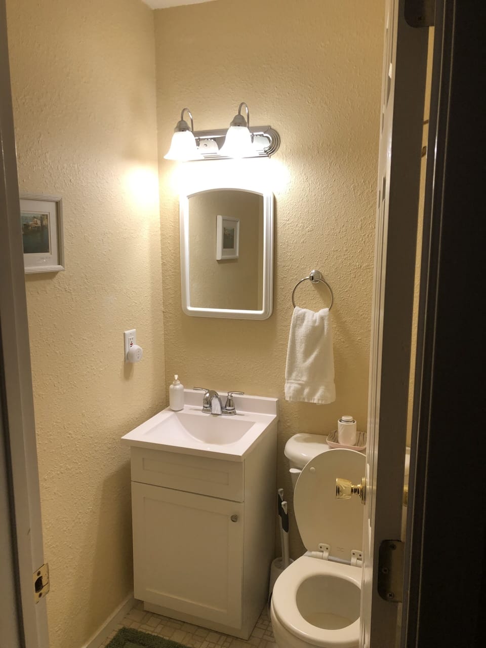 Powder room attached to main bedroom.