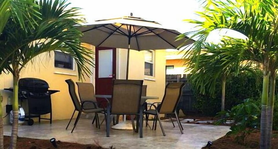 Another angle of comfortable, private, fenced-in backyard