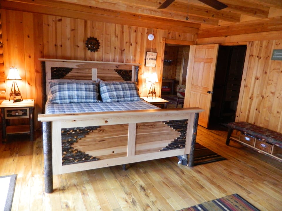 Downstairs Master Bedroom. King sized Amish custom made bed.