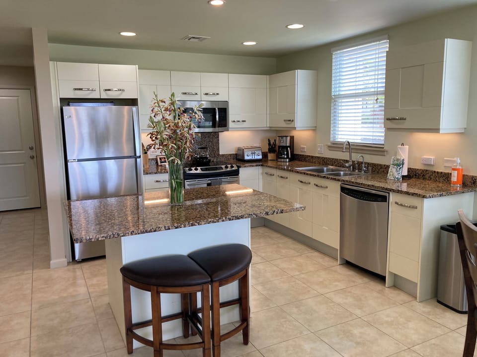 Spacious and convenient center kitchen island for Charcuterie spreads
