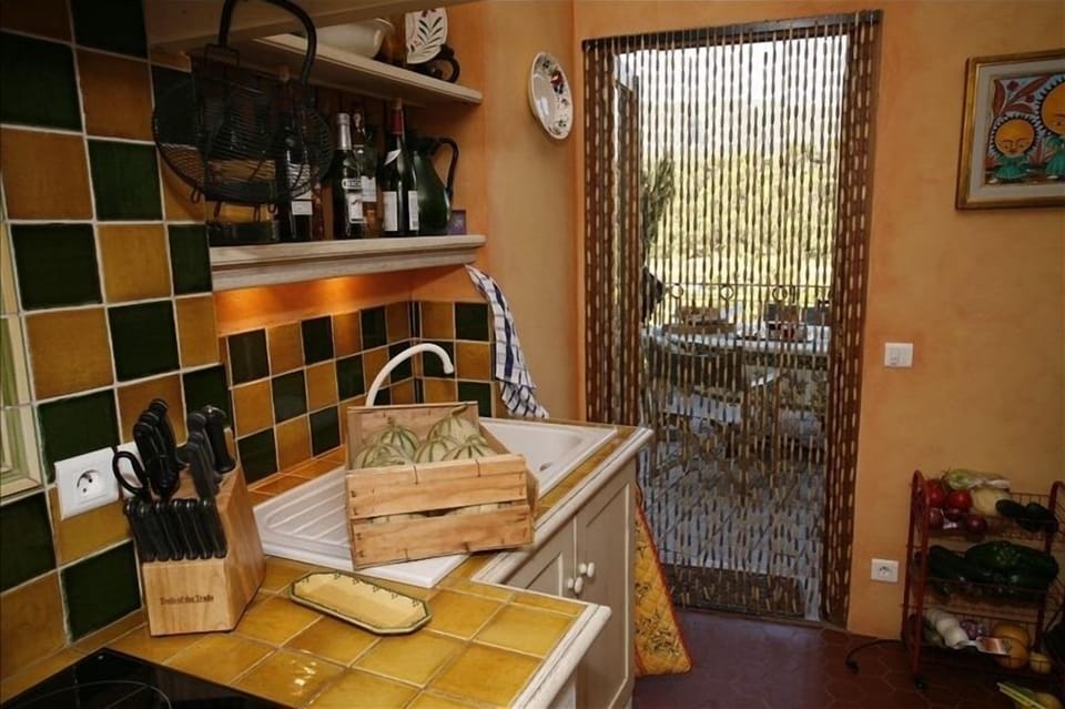 Kitchen, door to veranda