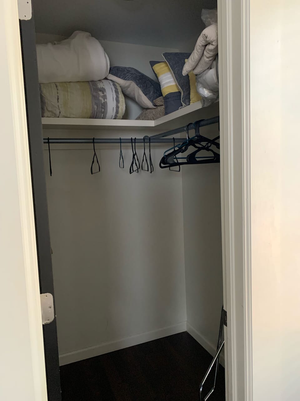 Additional blankets and pillows in master closet