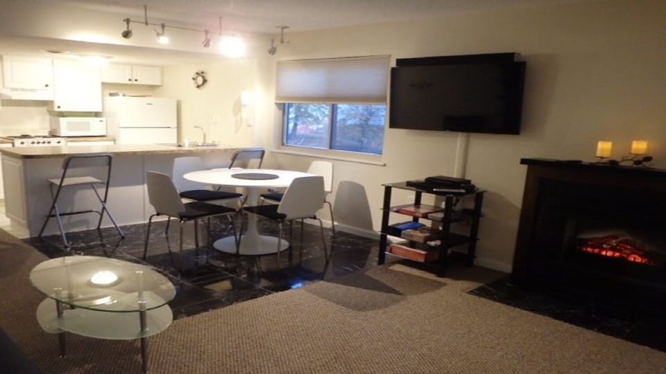 48" Smart TV w/ sound bar, Bluetooth enabled, on swivel  wall mount, DVD. 